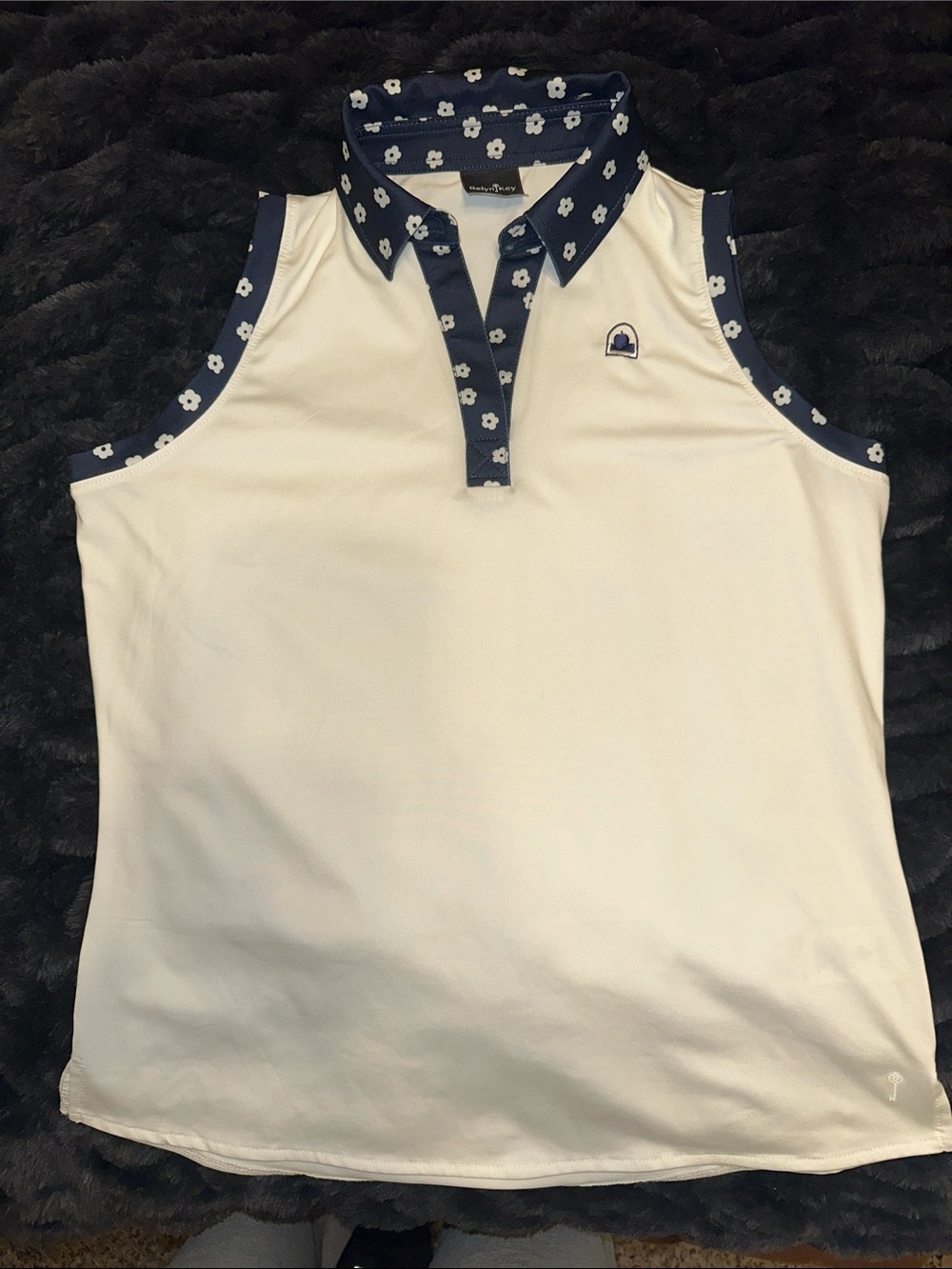 Belyn key Sleeveless Polo Top with Navy Floral Trim - White